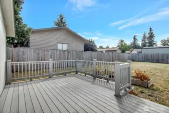 Trex deck off the family room is the perfect place for outdoor dining.