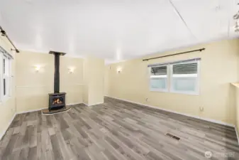 As you enter, notice the brand-new laminate flooring thru-out the home.