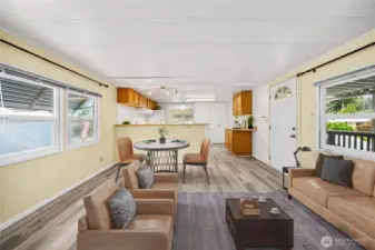 Virtually staged living and dining areas.