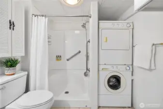 Convenient stacking washer and dryer stay with the house.