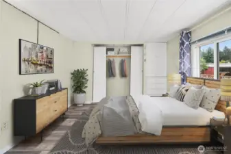 Virtually staged main bedroom.