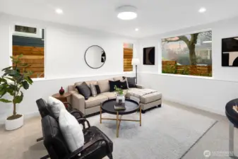 This is a very large en suite bedroom OR use it as a flex/den space! On the entry level.