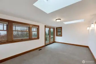 Here is a primary suite you'll never want to leave. You have views of the Cascade mountains and your own personal french door balcony!