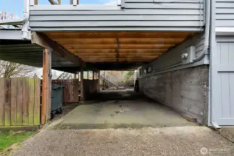 This carport space is the ideal weather protection for your car or toys!