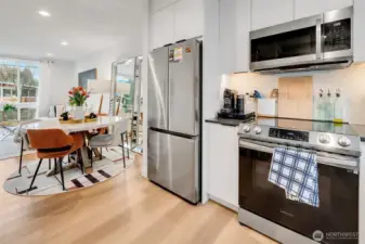 Kitchen opens seamlessly to dining area. Clean sightlines. Easy hosting and everyday functionality.