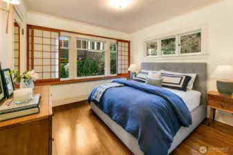 Two large corner bedrooms each facing private and quiet backyard. The SW bedroom easily accommodates a king bed and has lovely sliding window screens.