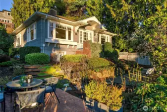 The home and gardens glimmer in the morning sun!