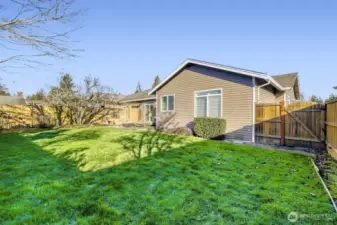 Fully fenced backyard with patio - landscaping is included with HOA!