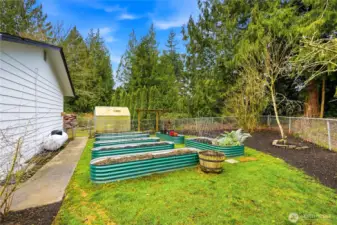 Raised garden beds on the right side of the house-imagine what you could grow!