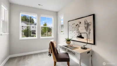 Private home office, den, dedicated TV room, playroom, crafts - multiple possibilities with this main level room