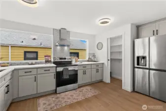 Fully redesigned kitchen with Brand new Stainless steel LG appliances, quartz 3cm countertops and elegant tile backsplash.