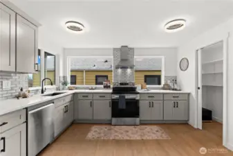 Large walk in pantry provides ample storage along with the brand new cabinets