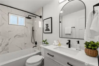 Full bathroom that is completely brand new. Featuring a rain shower head with a wand.