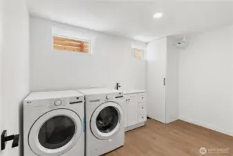 Brand new laundry room/utility room with a built in sink