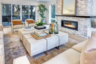 Family room opens to a covered outdoor living space that is the perfect place to enjoy the outdoors year round!