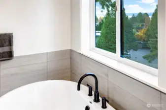 Enjoy pleasant views from your primary bath tub!