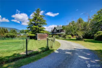 Driveway entrance to main home and lodge