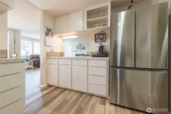 Full-height backsplash and ample cabinetry blend style and function.