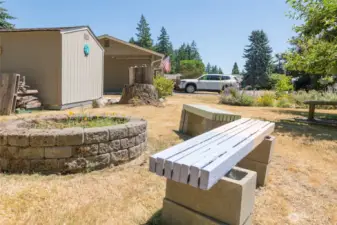A firepit offers an additional entertaining space.