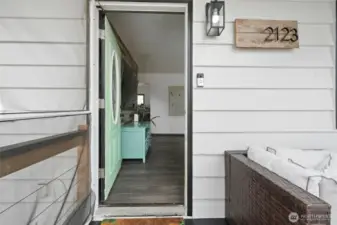 Front entrance to home from front yard decking