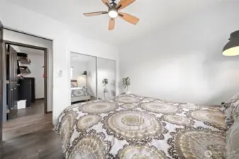 Main bedroom with glass closet doors