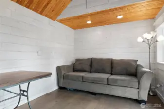 Interior of detached office with vaulted ceiling and rec