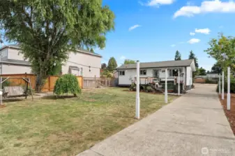 Large front yard view from gated entry