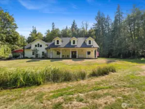 Situated on 5 private acres, this home features a 1-bedroom ADU, all main-floor bedrooms, and a spacious bonus room with massive storage above the garage. Charming details include a stamped-concrete front porch with dormers, while practical upgrades such as a large RV bay, AC throughout, solar panels, a newer roof, new well and pump, and numerous new appliances ensure peace of mind. Pre-inspected and backed by a 1-year warranty, this property combines comfort, function, and security in a gated community.