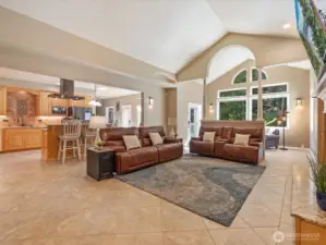 This true “great room” is spacious and welcoming without feeling overwhelming. Its extensive tile flooring adds durability and makes cleaning a breeze.