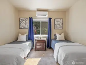 The second bedroom on this side of the home features its own mini-split AC unit, keeping the room cool in summer and cozy in winter—comfort you’ll really appreciate.