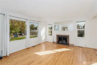 Big Picture window facing North and wood burning fireplace