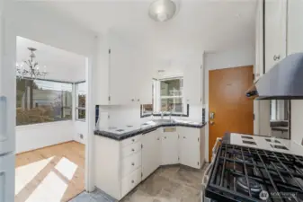 a look thru the kitchen toward the dining room & back door