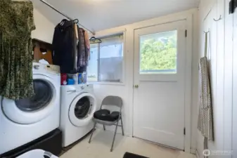 Mudroom/laundry leads to back entrance