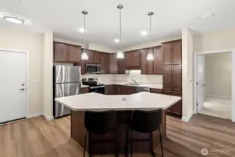 Kitchen to left of entry door