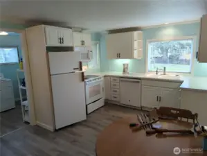 Another view of the cheery kitchen.