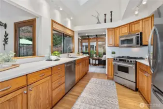 Gorgeous remodeled kitchen with gleaming hardwoods.