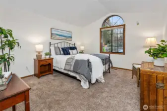 Main floor en suite bedroom has plenty of space.