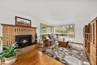 Upstairs living room with large picture windows.