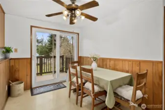 Dining space with slider out to the deck.