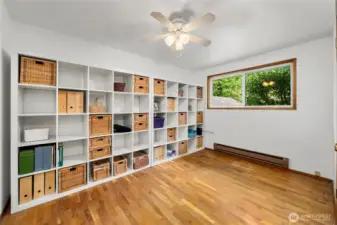 Bedroom #3 with wall to wall storage.