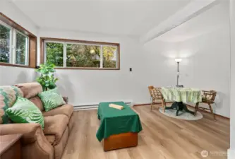 Popcorn ceiling removed, fresh drywall and paint and new flooring.