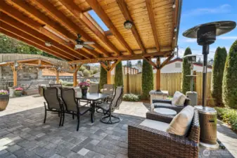 The dream continues in the backyard, where every element of outdoor living has been thoughtfully designed for enjoyment.