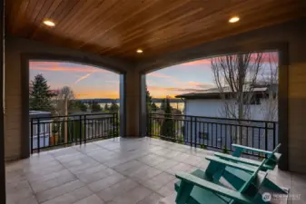 Watch sunsets sparkle over the water from your private, covered balcony.