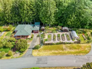 Aerial view of property which includes house, studio and adjacent lot (separate tax parcel), currently a wonderful garden.