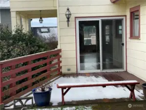 Sliding door opens to deck off living room.