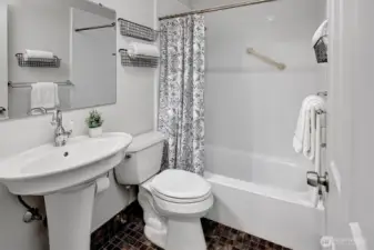 Light and bright full bathroom off the bedroom.