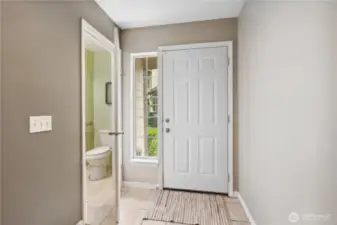 Half bath located right by the front door.