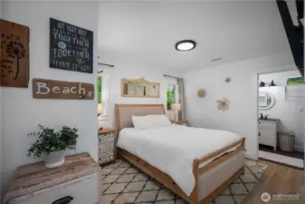 Primary bedroom with ensuite 3/4 bath.