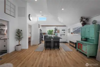 Spacious open floor plan with soaring shiplap ceilings.