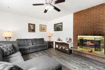 Cozy wood burning fireplace in living room